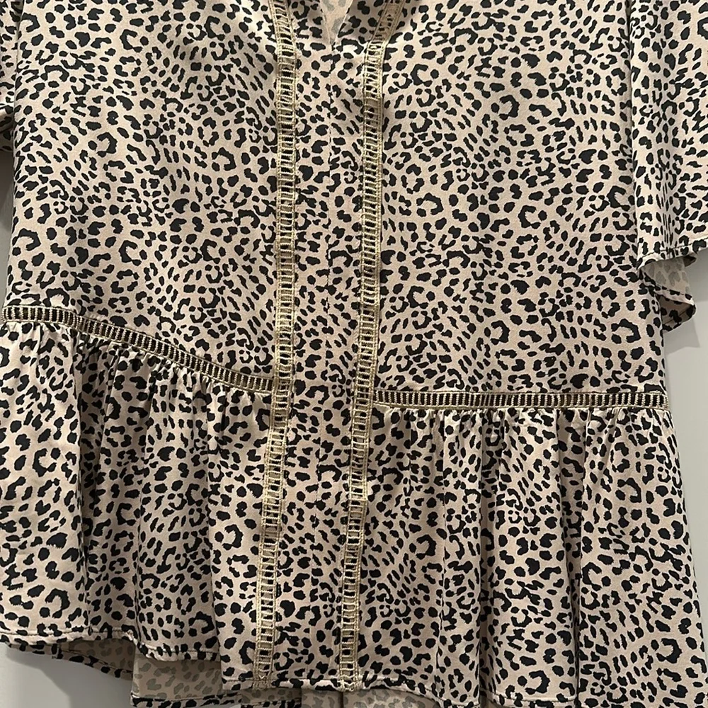 Beautiful Express 100% Rayon animal print top dry cleaned